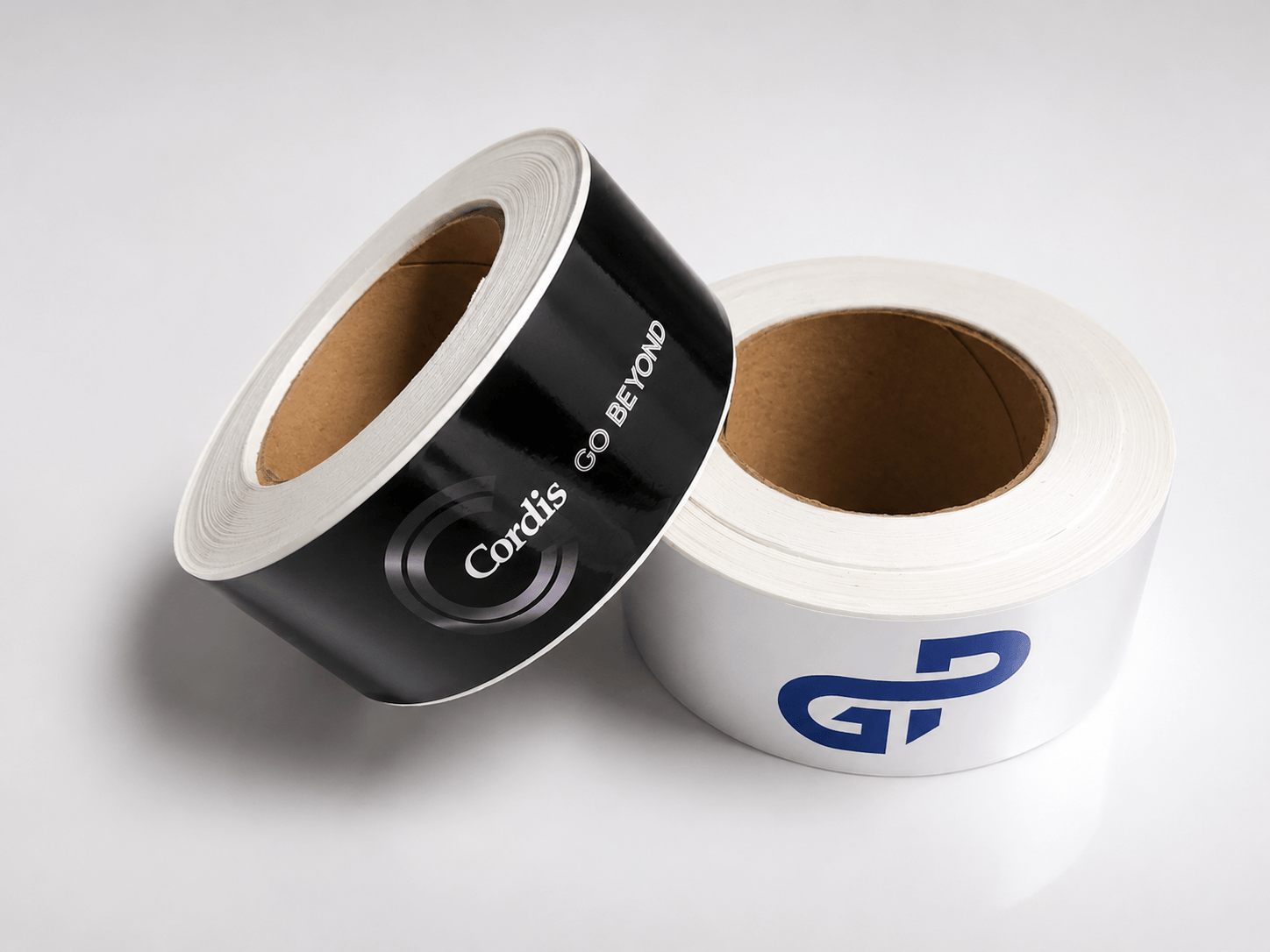 Two printed rolls of custom bottle labels